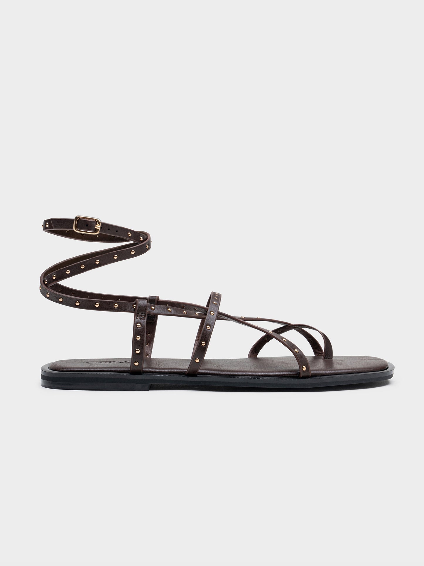 SANDALIA PLANA TACHUELAS ROMANA BROWN